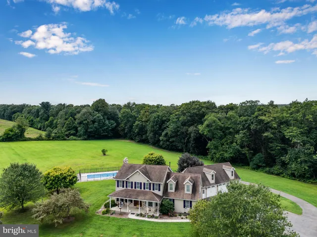 a view of a house with a big yard