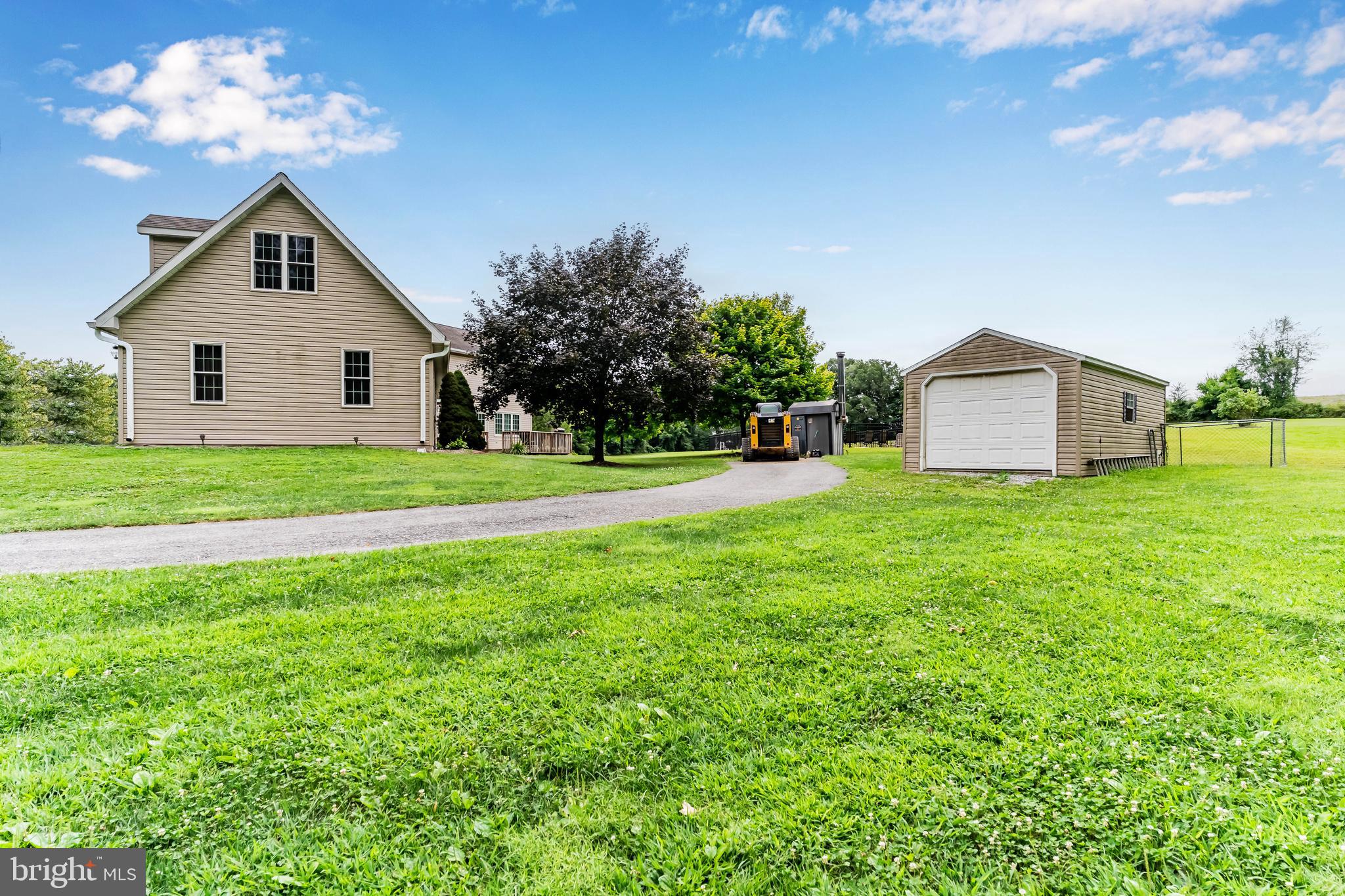 392 Peach Glen Road Gardners, PA 17324 - Photo 24 of 72 a view of a house with a yard and large trees