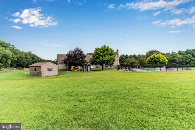a view of a a dining room with furniture window and outside view