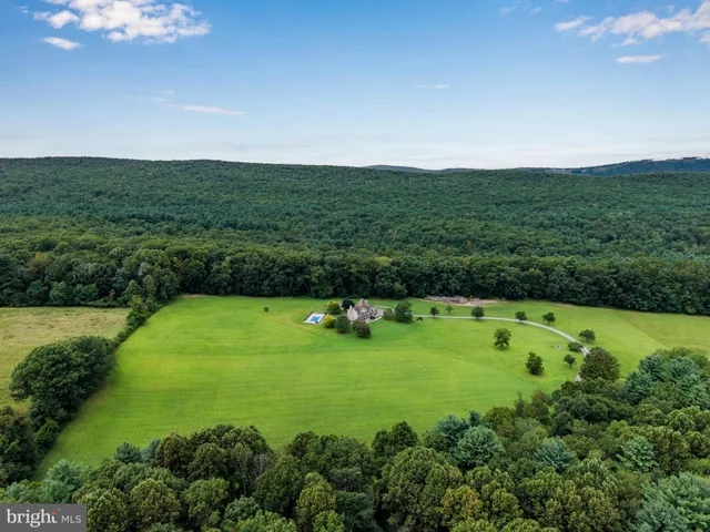 a room with furniture and gym equipment