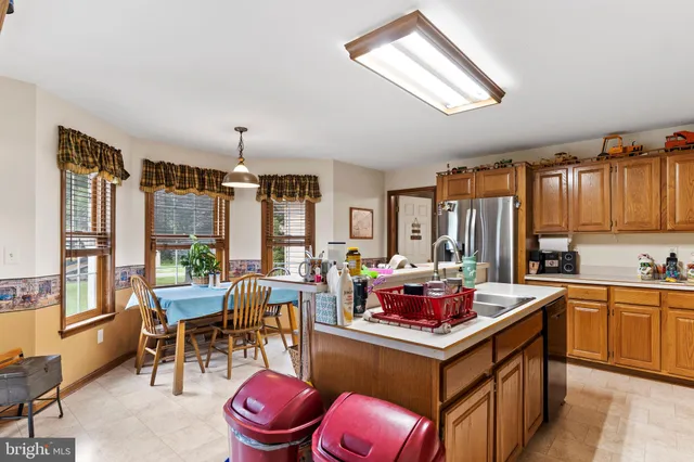 a bedroom with a bed and furniture