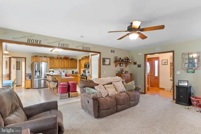a view of livingroom with washer and dryer