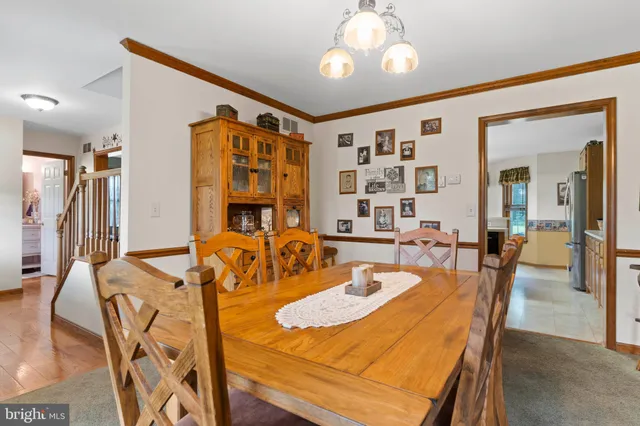 a en suite bathroom with a double vanity sink a mirror and shower