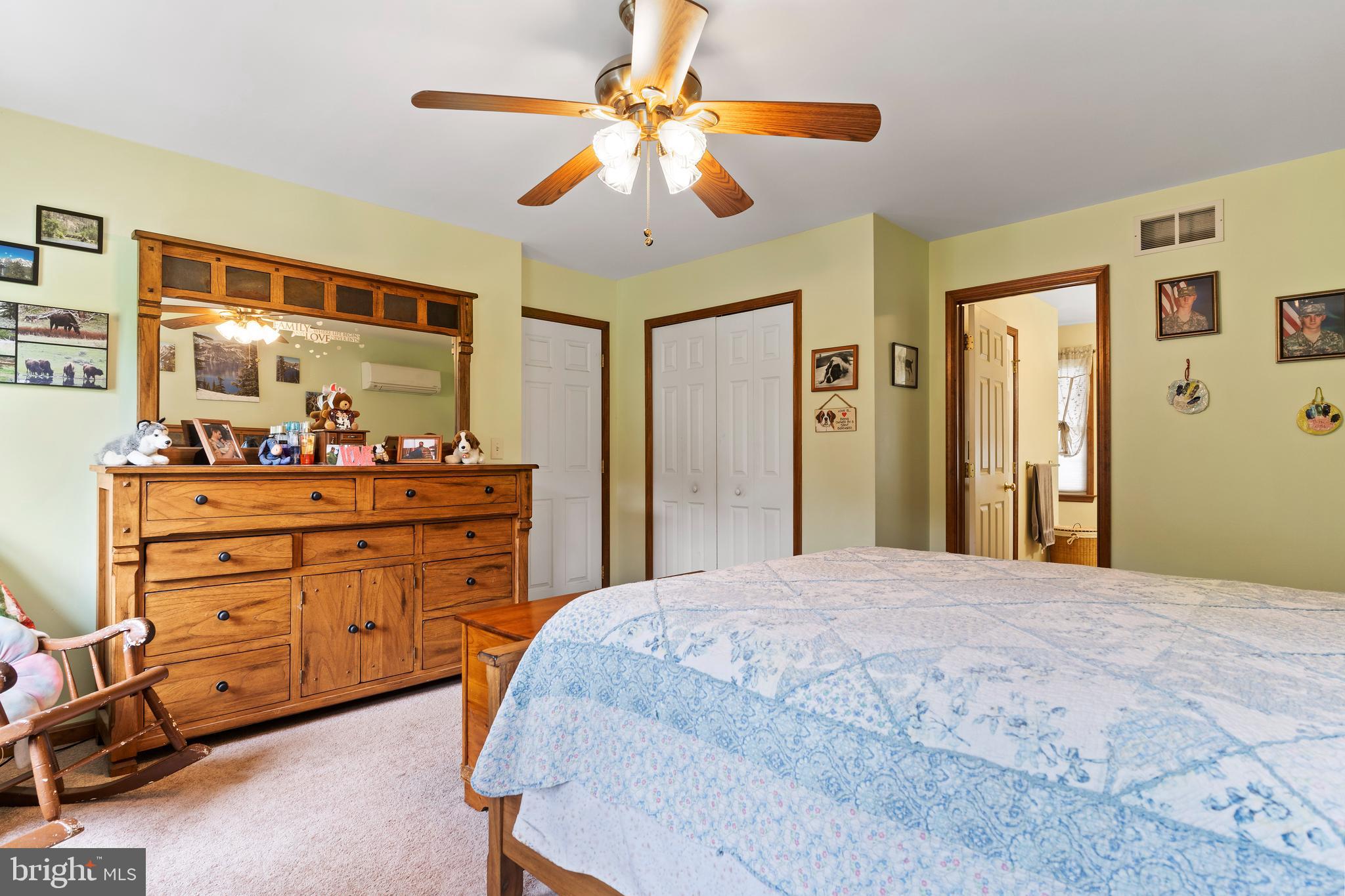 392 Peach Glen Road Gardners, PA 17324 - Photo 53 of 72 a bedroom with a bed and a dresser