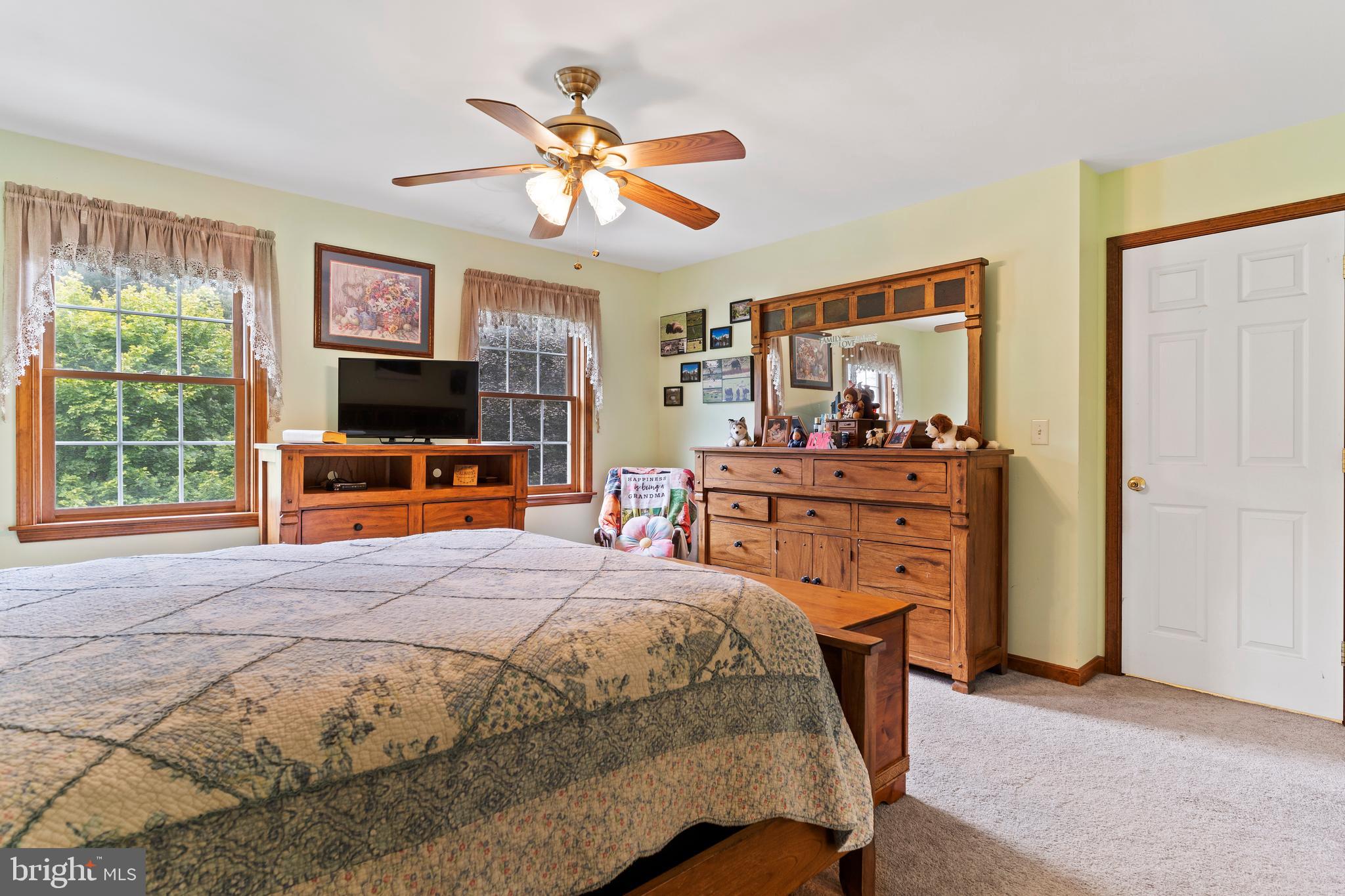 392 Peach Glen Road Gardners, PA 17324 - Photo 55 of 72 a bedroom with a bed and furniture