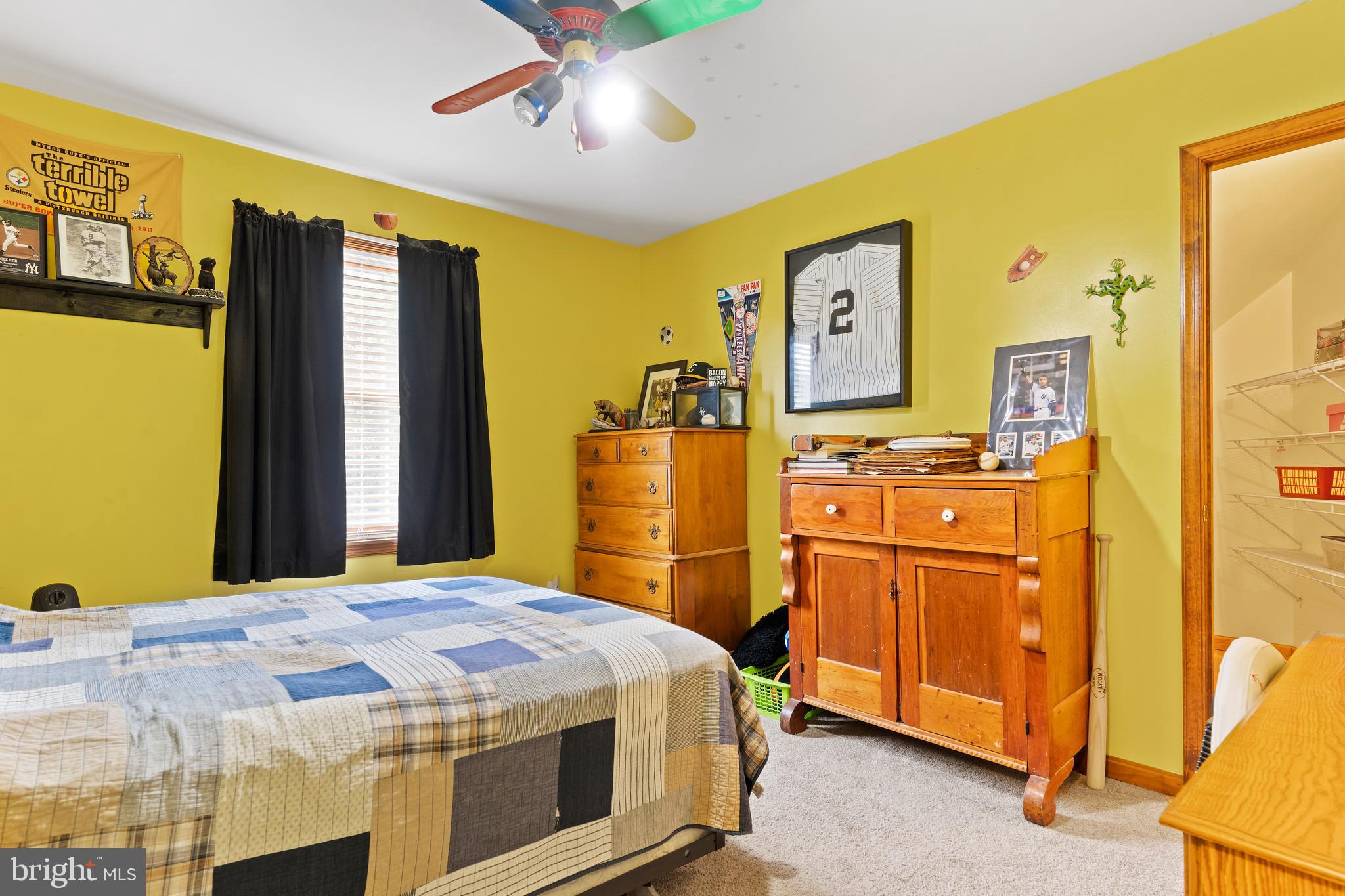 392 Peach Glen Road Gardners, PA 17324 - Photo 62 of 72 a bedroom with a bed and wooden furniture