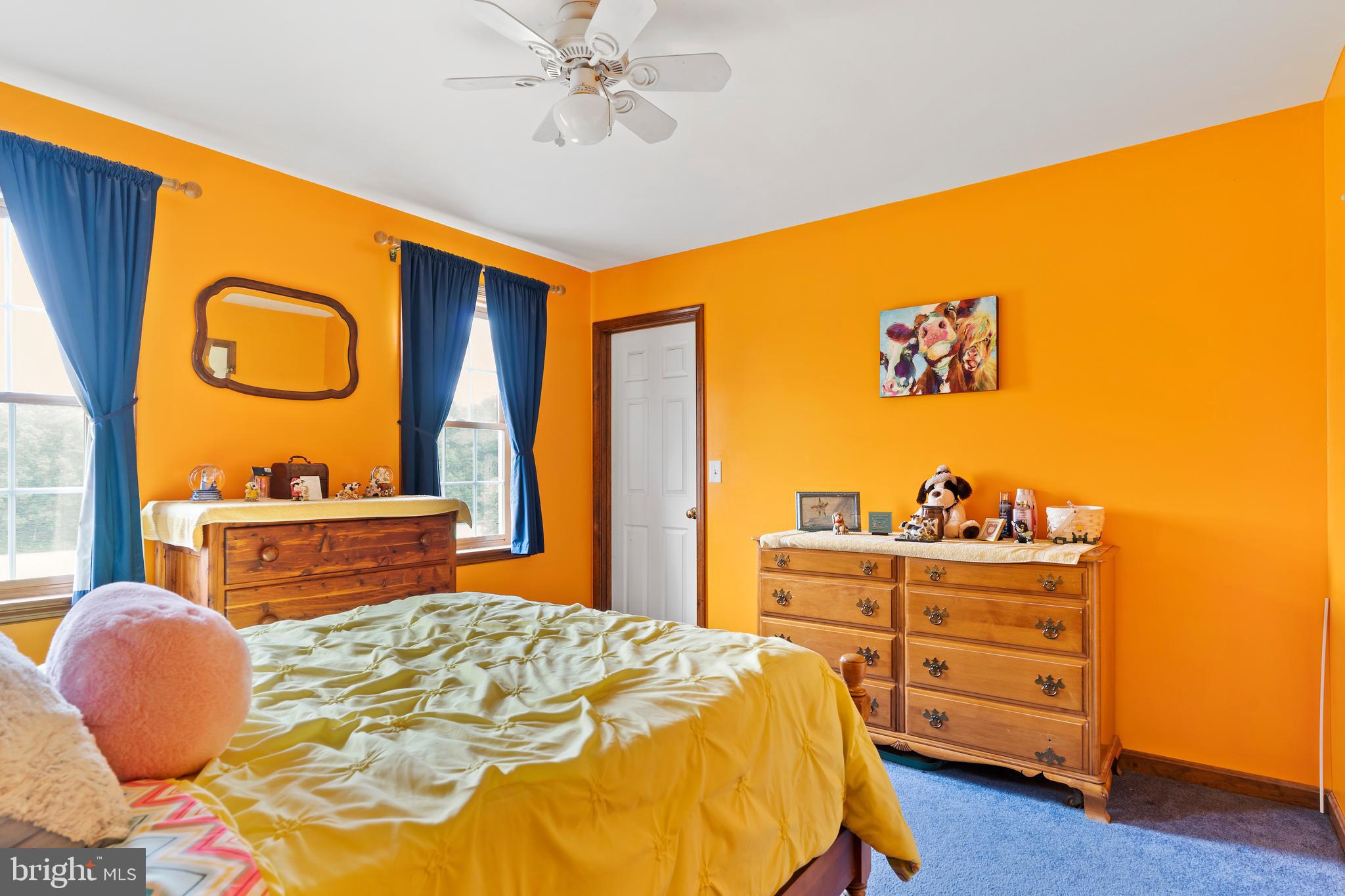 392 Peach Glen Road Gardners, PA 17324 - Photo 64 of 72 a bed room with a bed and a chair