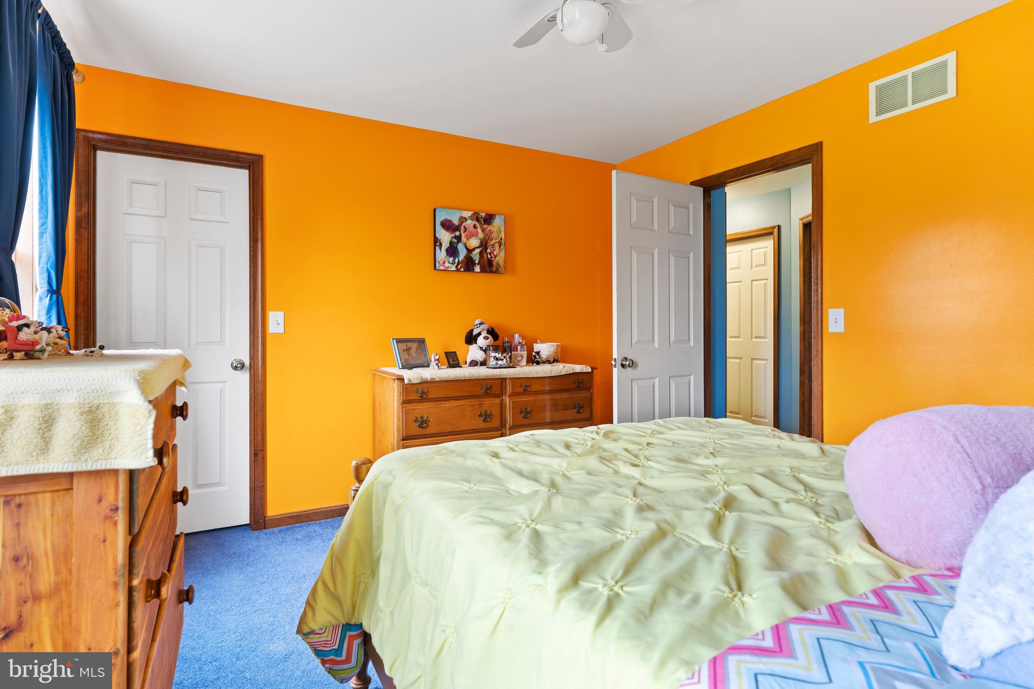 392 Peach Glen Road Gardners, PA 17324 - Photo 65 of 72 a bedroom with a bed and wooden floor