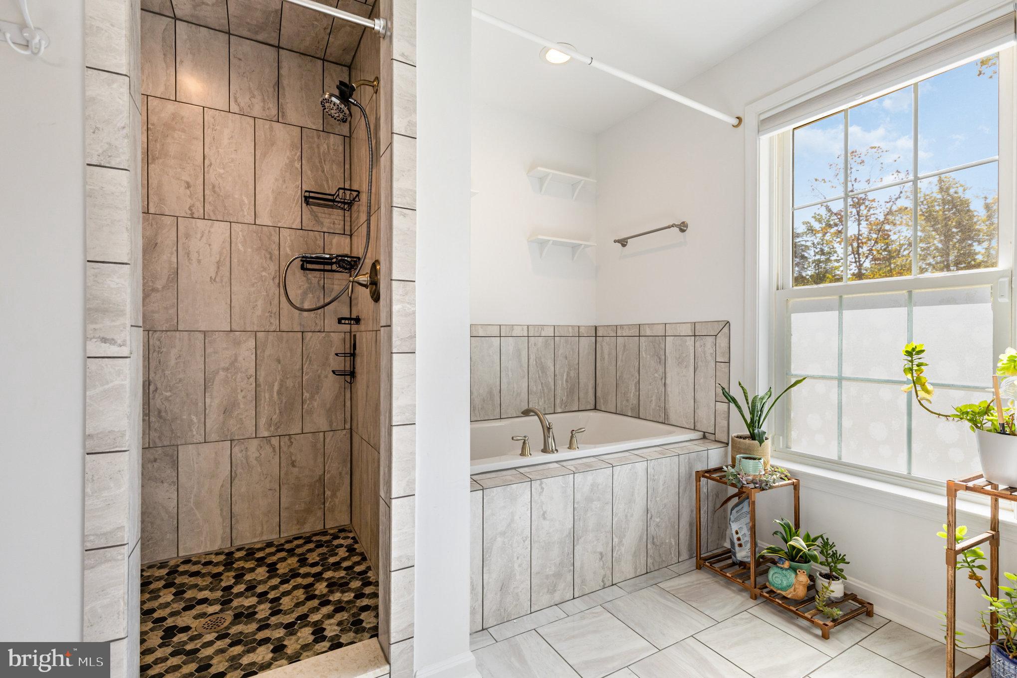 5428 Ridge Road Spotsylvania, VA 22551 - Photo 18 of 63 Primary Bath with Tile Shower and Tub