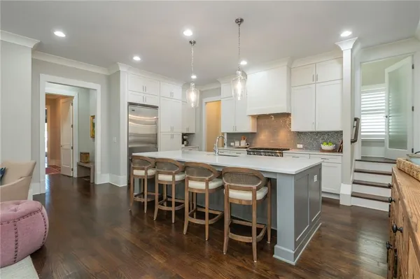 a living room with furniture or kitchen and a fireplace