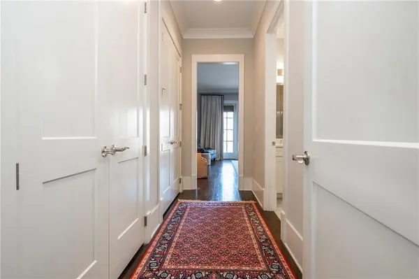 a living room with furniture rug and a large window