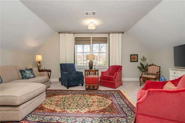 a front view of a house with glass windows
