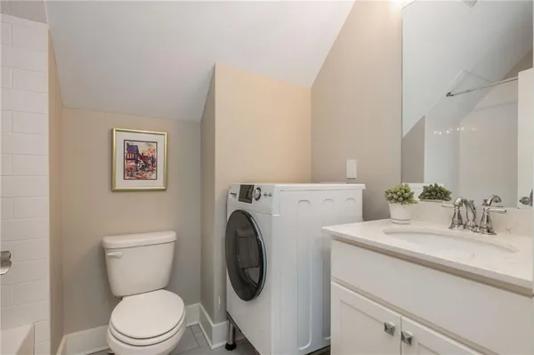 an aerial view of a house with a swimming pool