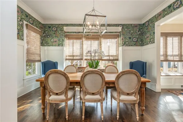 a large kitchen with stainless steel appliances kitchen island granite countertop a large counter top and stove