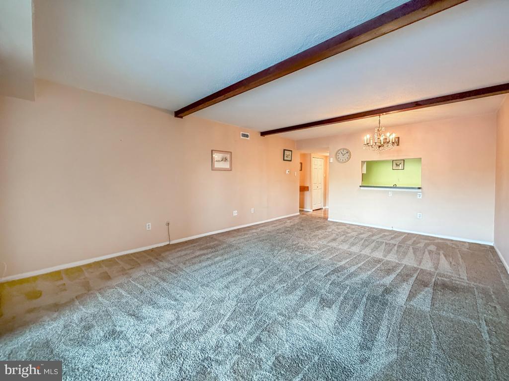 6105 Delaire Landing Road, Unit 105 Philadelphia, PA 19114 - Photo 15 of 39 Living room to dining room