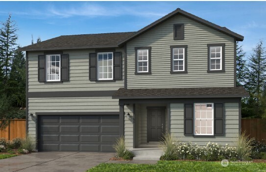 725 Madden Avenue, Unit 17 Buckley, WA 98321 - Photo 1 of 4 a front view of a house