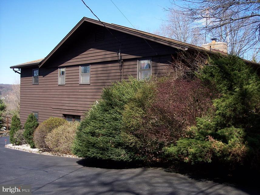 560 Blue Lake Road Denver, PA 17517 - Photo 26 of 27 a front view of a house with a yard