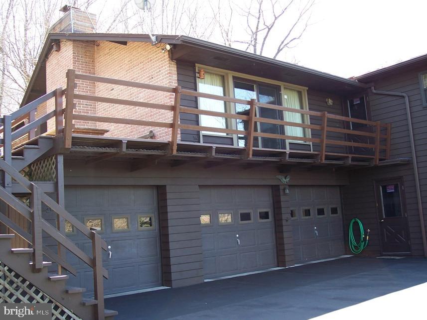 560 Blue Lake Road Denver, PA 17517 - Photo 9 of 27 a front view of a building with glass windows