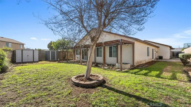 a backyard of house with garden