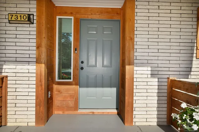 a view of a door and a outdoor space