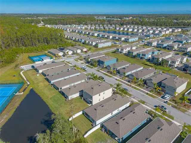 an aerial view of residential building with outdoor space