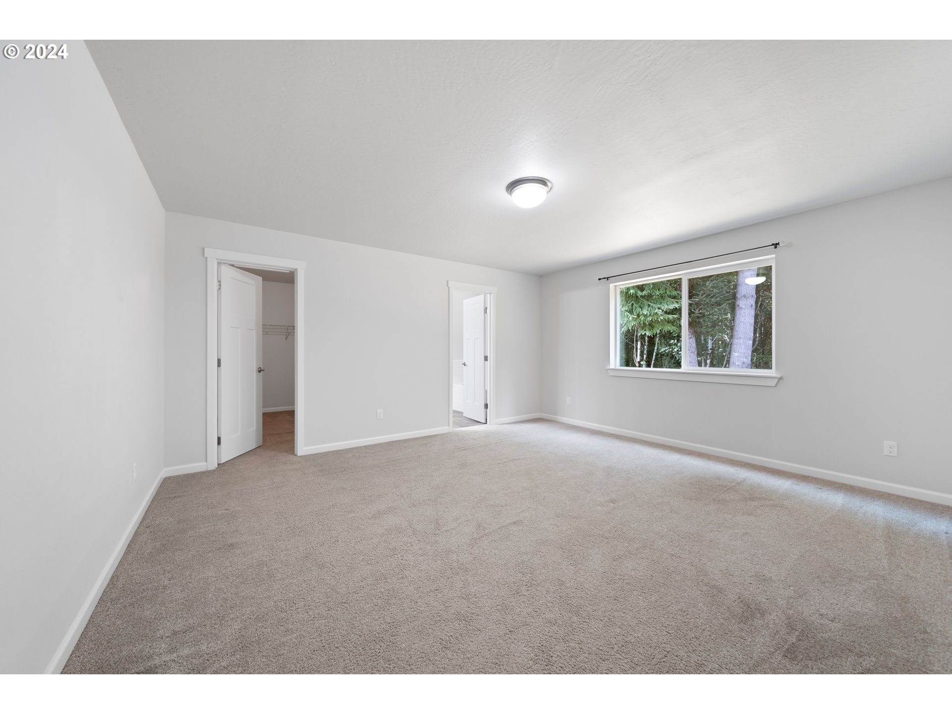 470 Providence Drive Reedsport, OR 97467 - Photo 13 of 41 a view of an empty room with a window