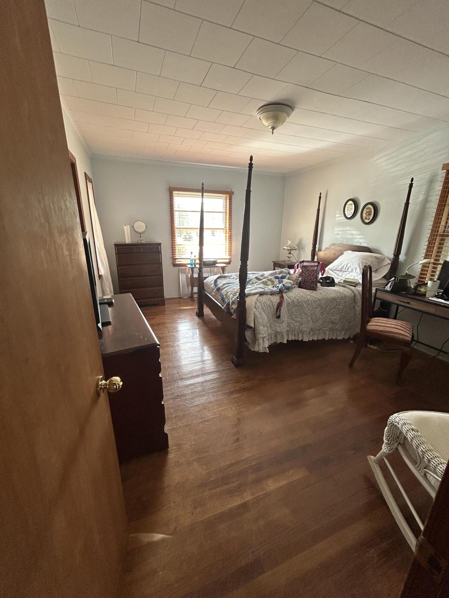 7151 Co Highway 280 DeFuniak Springs, FL 32435 - Photo 13 of 15 a living room with furniture and a flat screen tv