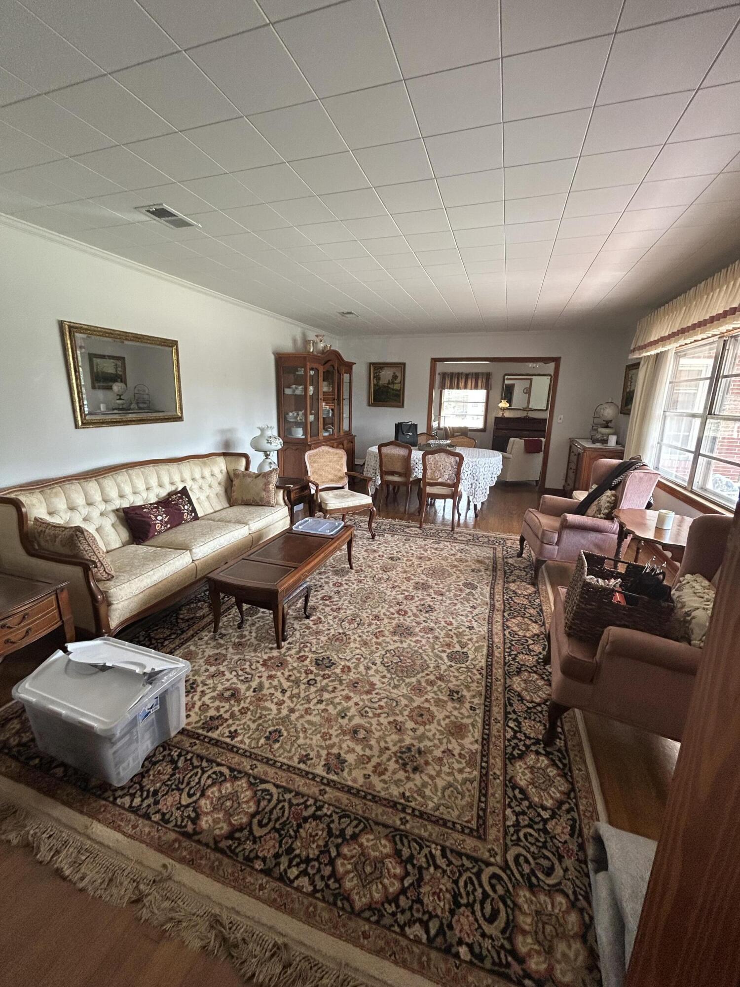 7151 Co Highway 280 DeFuniak Springs, FL 32435 - Photo 3 of 15 a living room with furniture a rug and a window