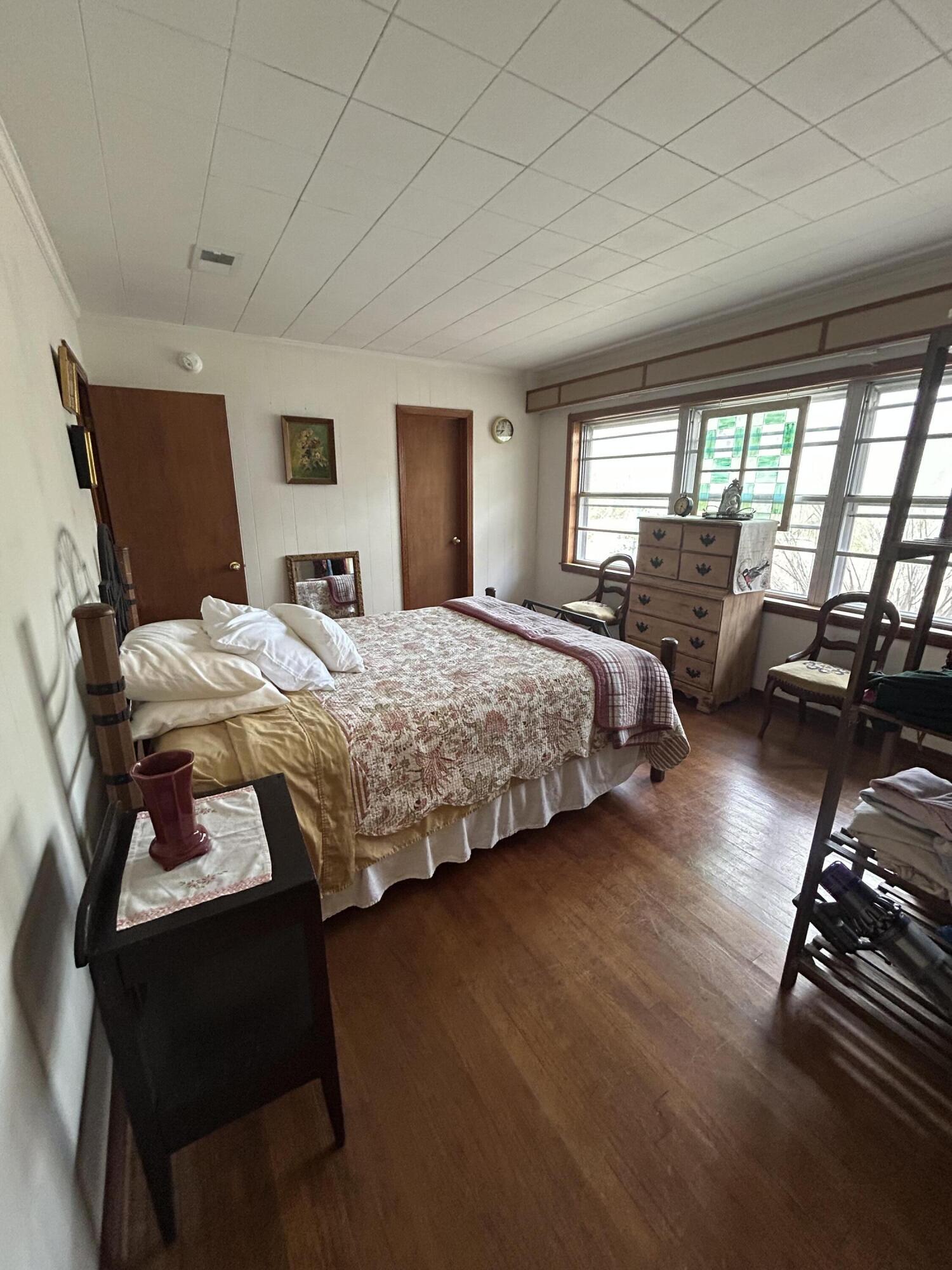 7151 Co Highway 280 DeFuniak Springs, FL 32435 - Photo 10 of 15 a bedroom with furniture and a large window