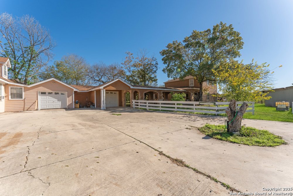 2930 Shane Road San Antonio, TX 78223 - Photo 1 of 75 a front view of house with yard and green space