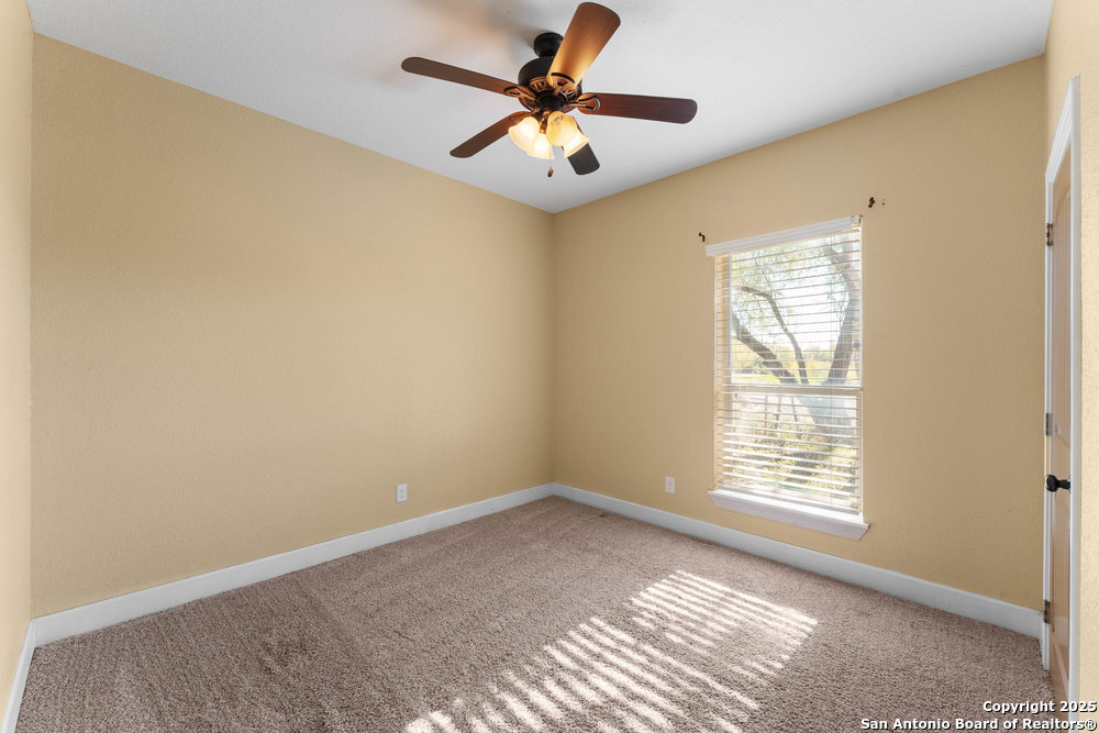 2930 Shane Road San Antonio, TX 78223 - Photo 14 of 75 a view of an empty room with a window