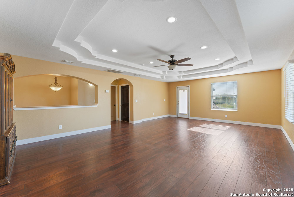 2930 Shane Road San Antonio, TX 78223 - Photo 19 of 75 an empty room with wooden floor and windows