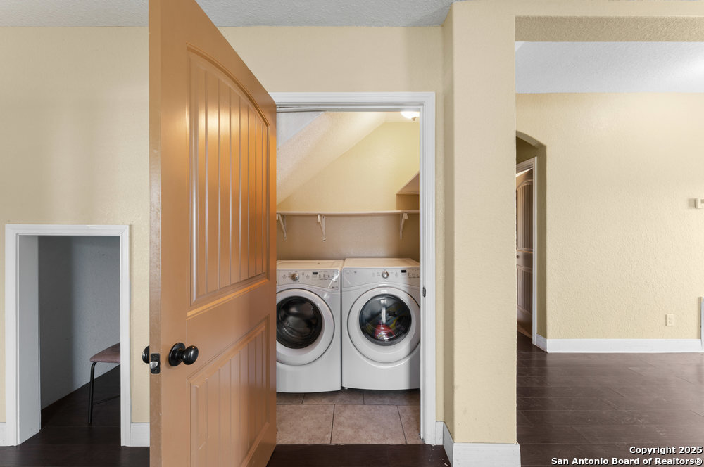 2930 Shane Road San Antonio, TX 78223 - Photo 20 of 75 a utility room with dryer and washer