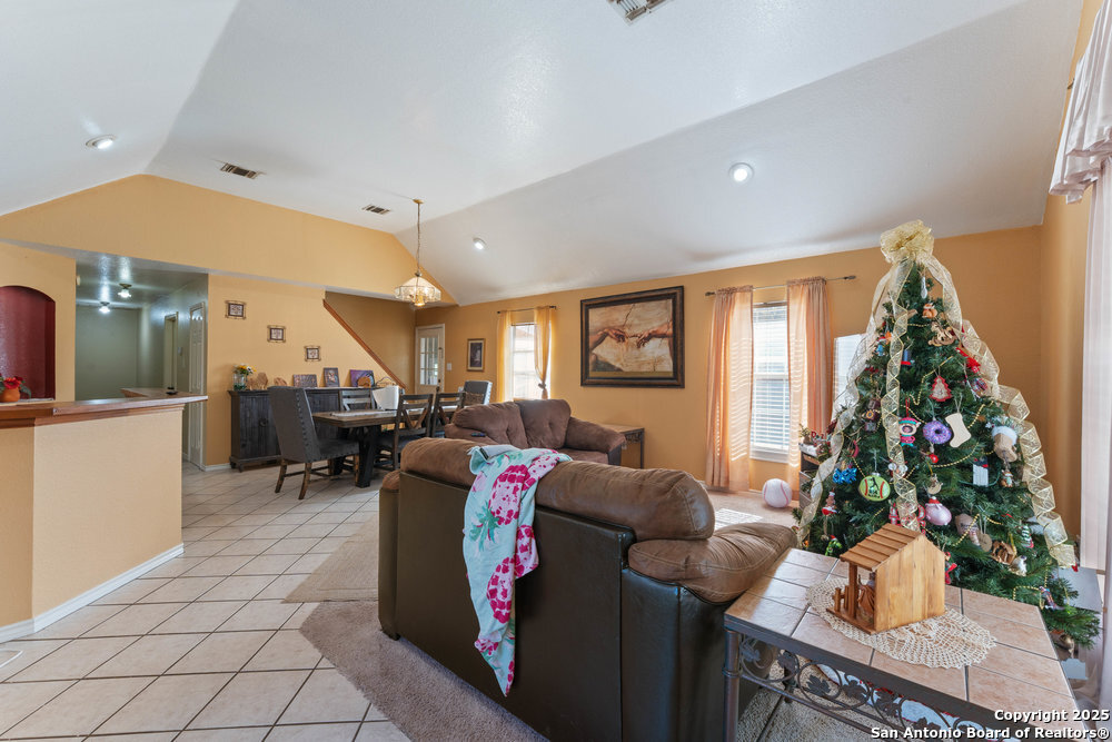 2930 Shane Road San Antonio, TX 78223 - Photo 26 of 75 a living room with furniture and a potted plant