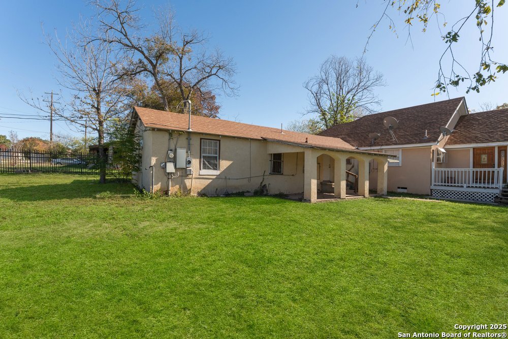 2930 Shane Road San Antonio, TX 78223 - Photo 54 of 75 a view of a house with backyard and a garden