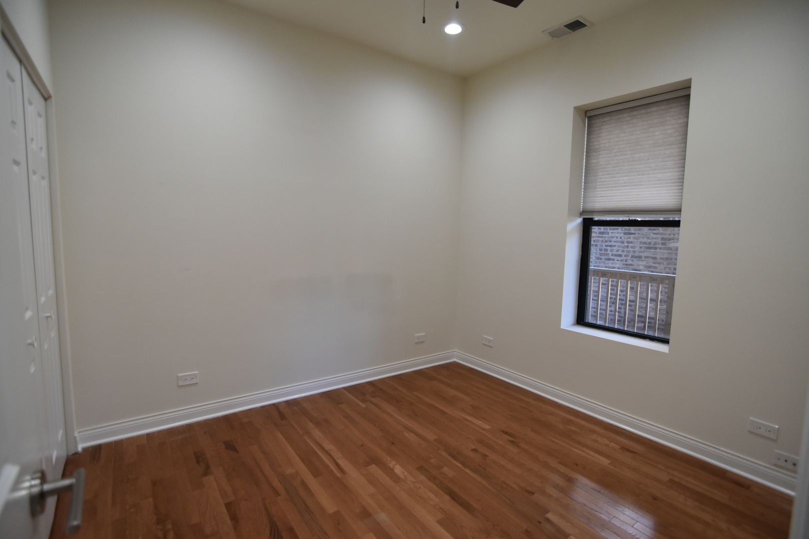 732 West Grace Street, Unit 2W Chicago, IL 60613 - Photo 11 of 15 an empty room with a window