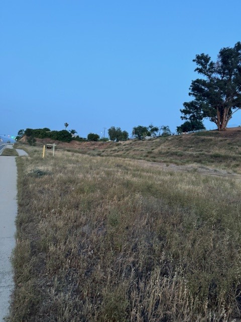 92399 Yucaipa Boulevard Yucaipa, CA 92399 - Photo 3 of 3 a view of a field with an trees in the background
