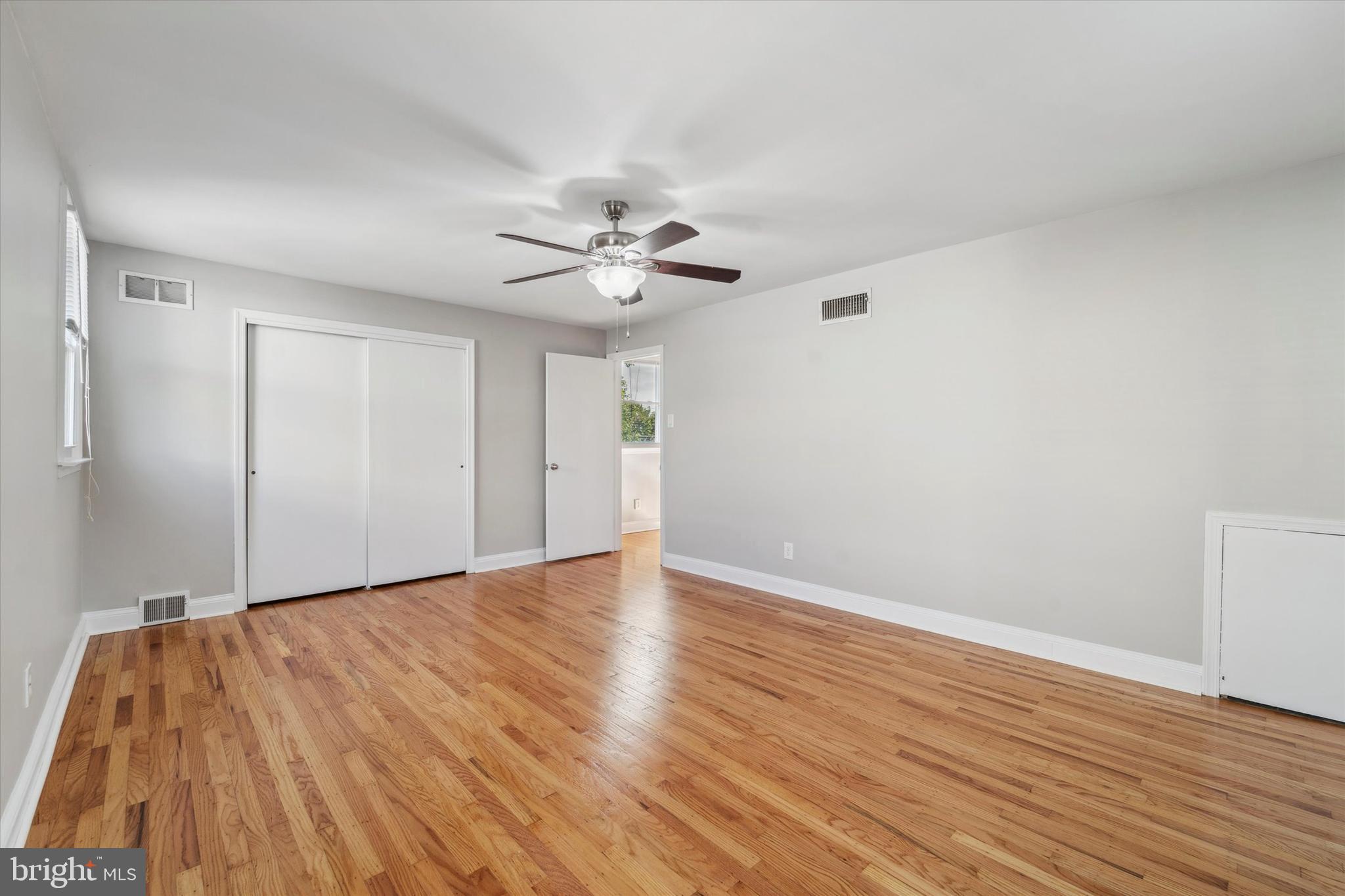 1718 Mt Pleasant Road Havertown, PA 19083 - Photo 14 of 30 a view of an empty room with wooden floor