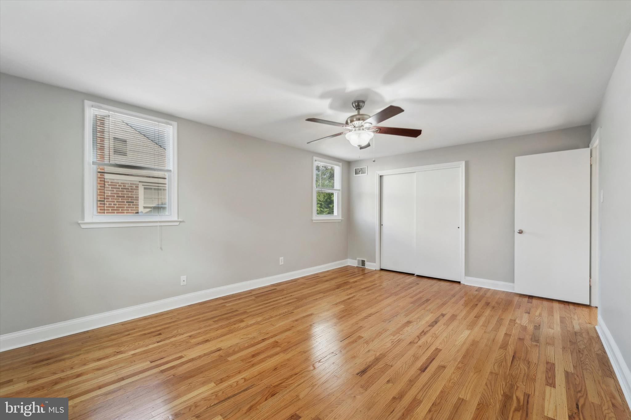 1718 Mt Pleasant Road Havertown, PA 19083 - Photo 15 of 30 a view of an empty room with wooden floor and a window