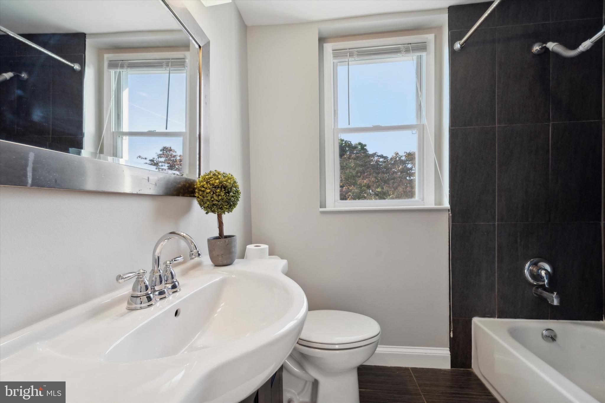 1718 Mt Pleasant Road Havertown, PA 19083 - Photo 20 of 30 a bathroom with a sink toilet and shower