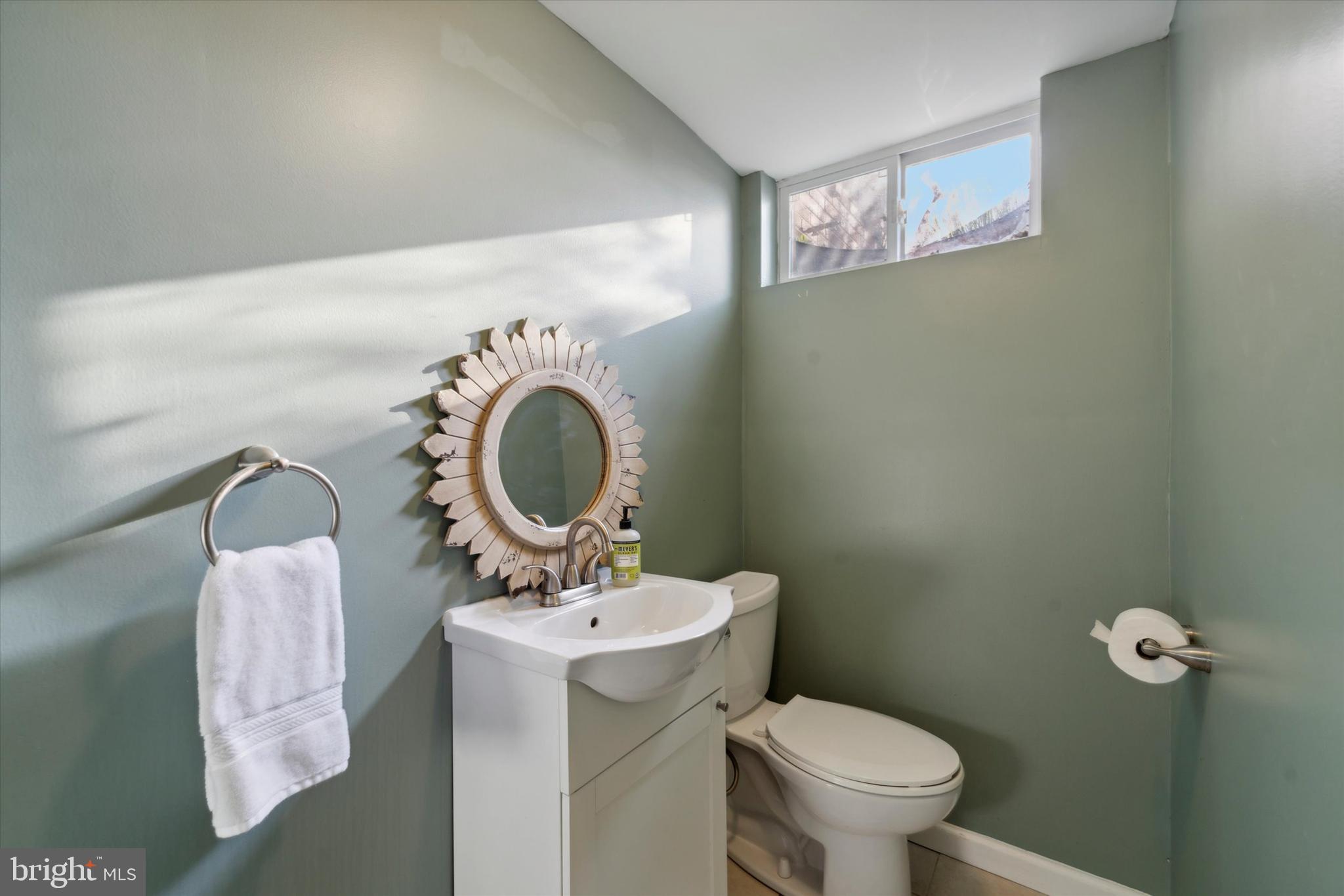 1718 Mt Pleasant Road Havertown, PA 19083 - Photo 23 of 30 a bathroom with a toilet sink and mirror