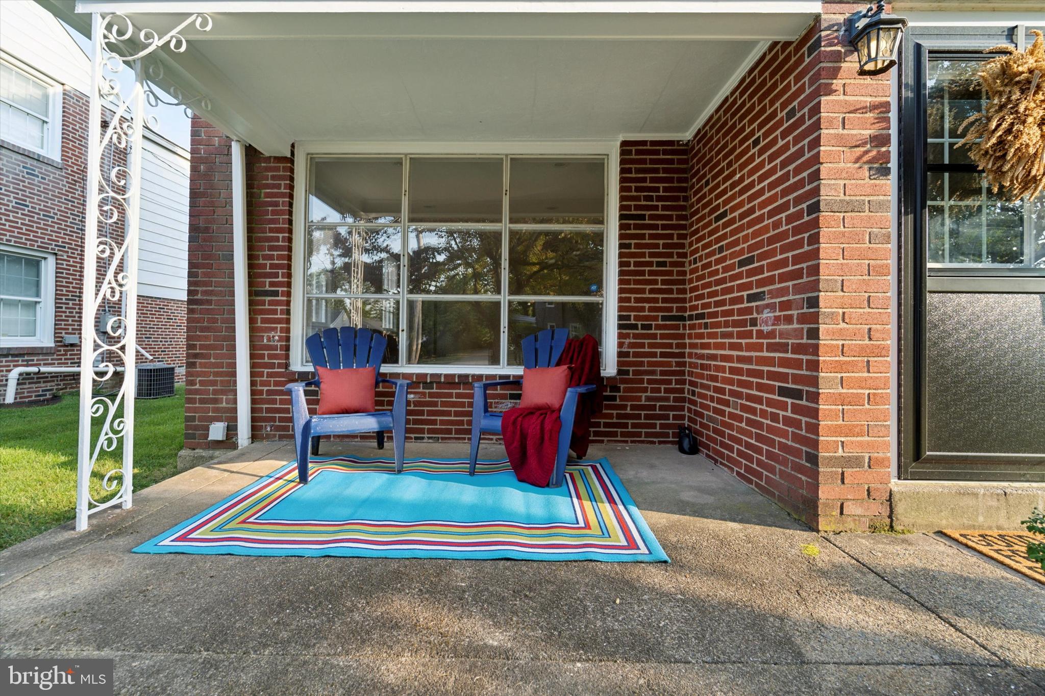 1718 Mt Pleasant Road Havertown, PA 19083 - Photo 28 of 30 a building outdoor space with seating and a potted plant
