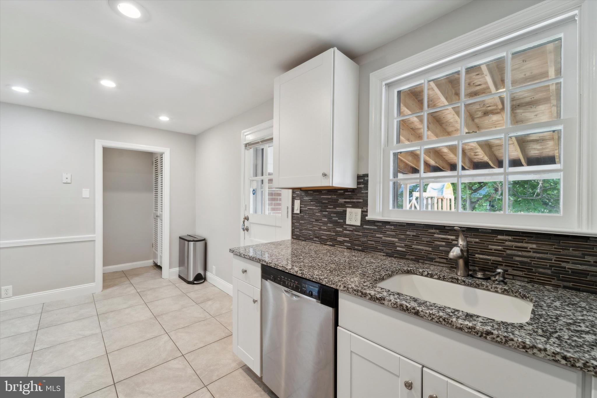 1718 Mt Pleasant Road Havertown, PA 19083 - Photo 9 of 30 a kitchen with a sink and a window