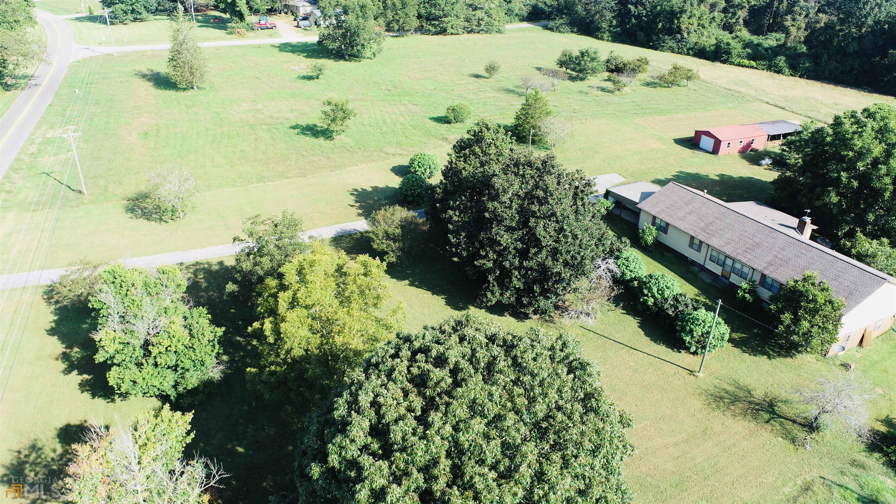 560 Glenloch Road Roopville, GA 30170 - Photo 1 of 1 a view of a garden with a yard