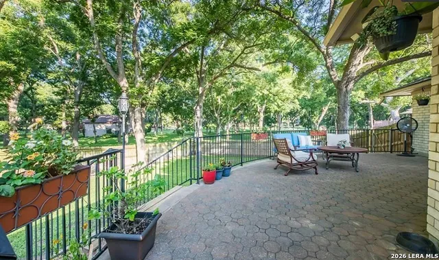 a view of a bench in a backyard