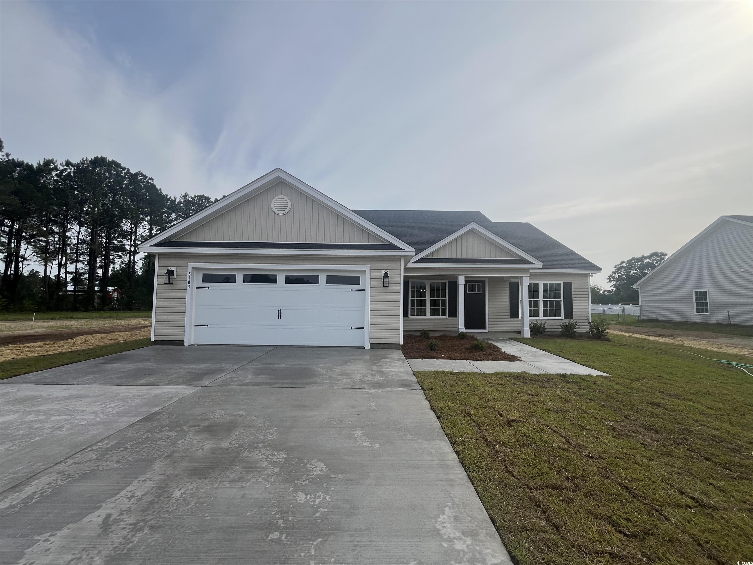 8183 Kerl Road Aynor, SC 29511 - Photo 1 of 15 Ranch-style home with concrete driveway, a front y