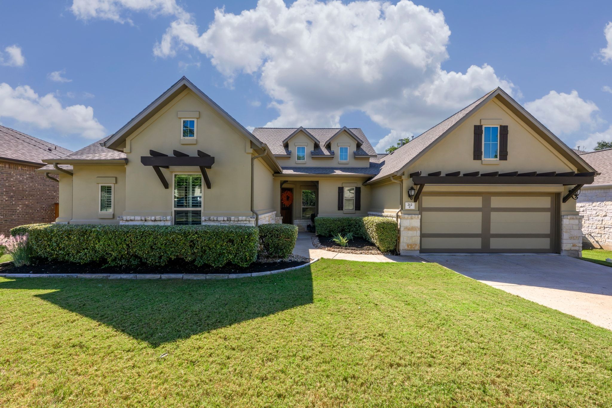 212 Lake Rim Circle Georgetown, TX 78633 - Photo 1 of 1 a front view of a house with a yard and garage