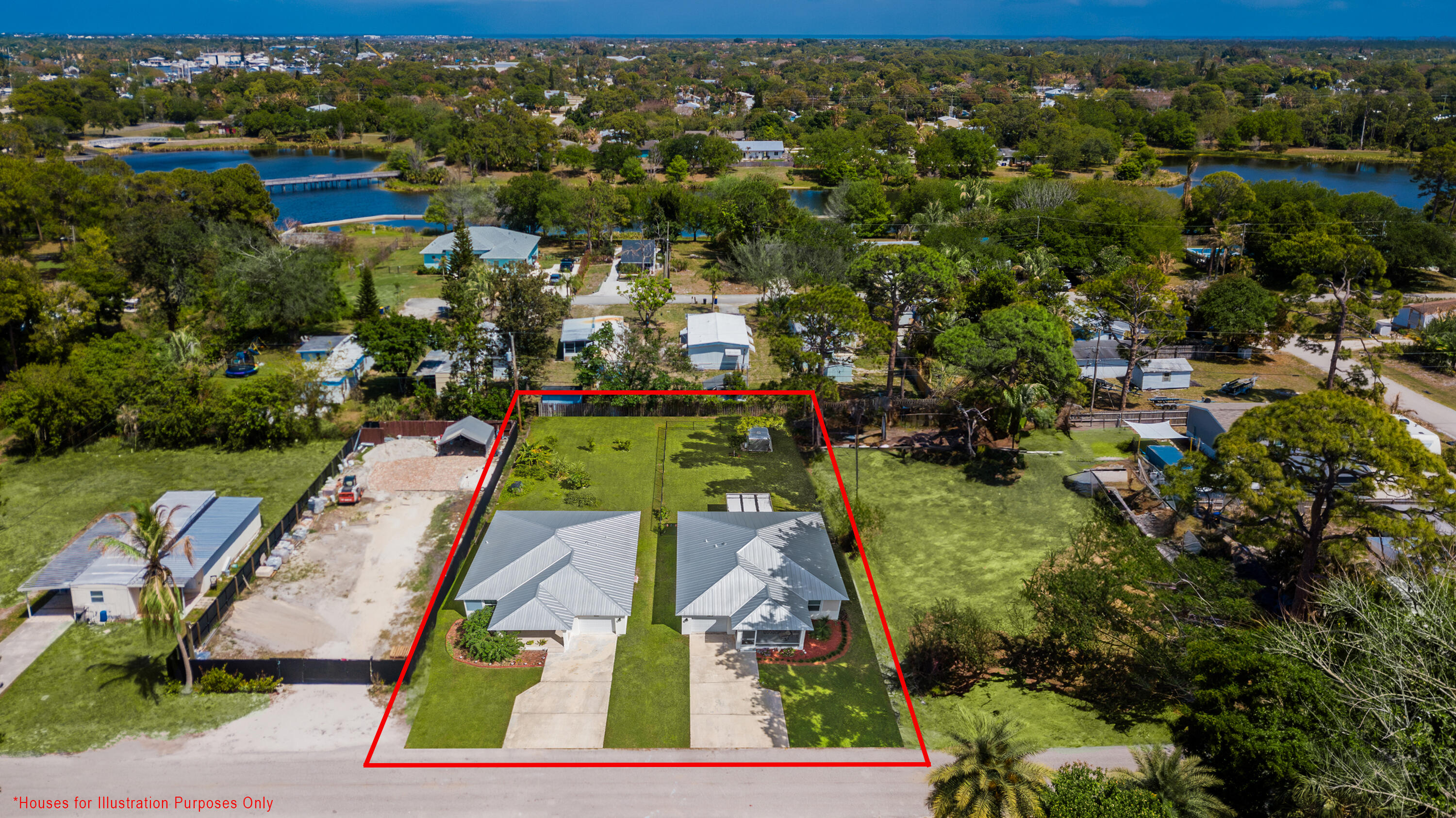 5279 Southeast Isabelita Avenue Stuart, FL 34997 - Photo 2 of 8 an aerial view of a houses with a yard