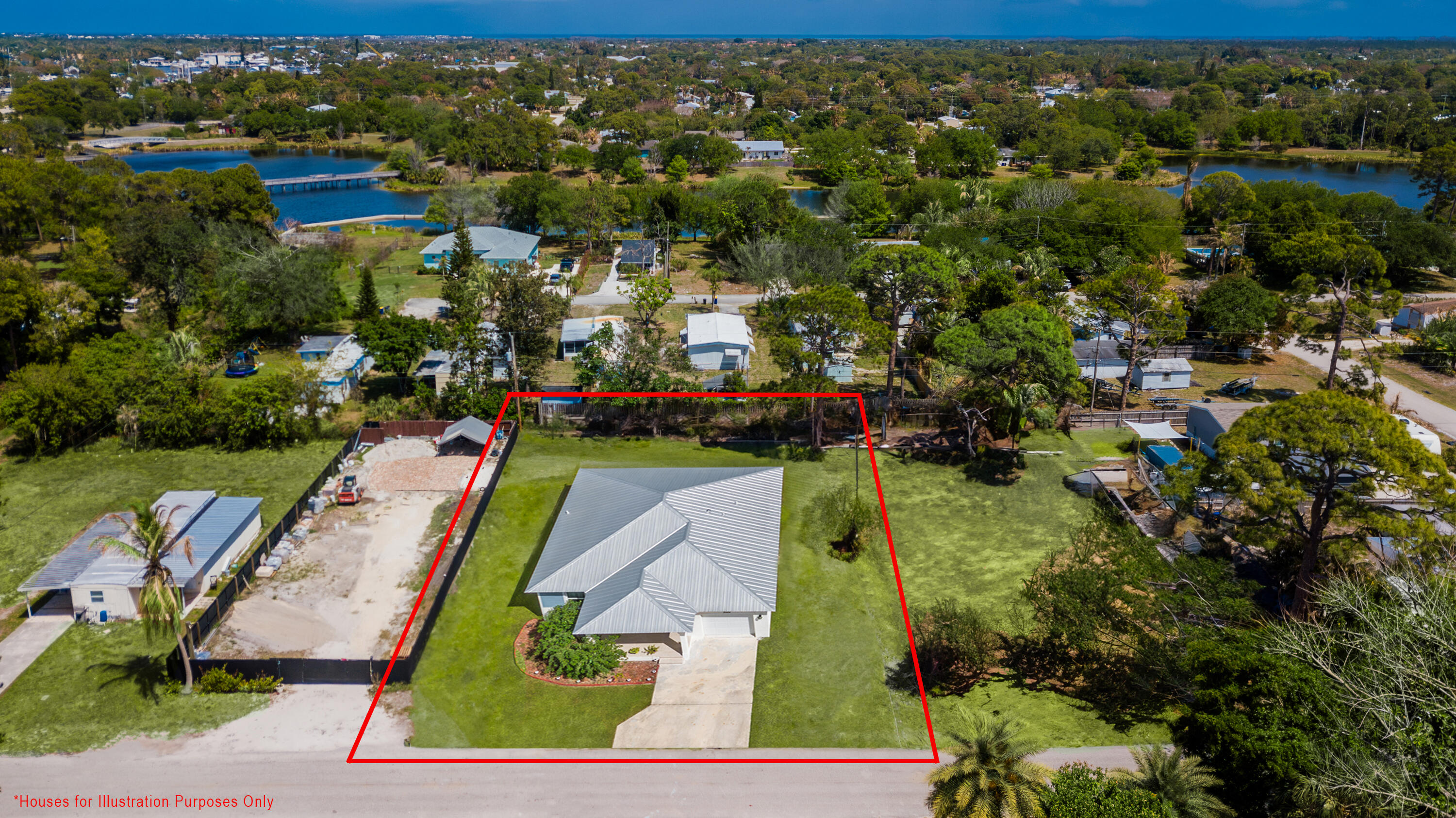 5279 Southeast Isabelita Avenue Stuart, FL 34997 - Photo 4 of 8 an aerial view of a city
