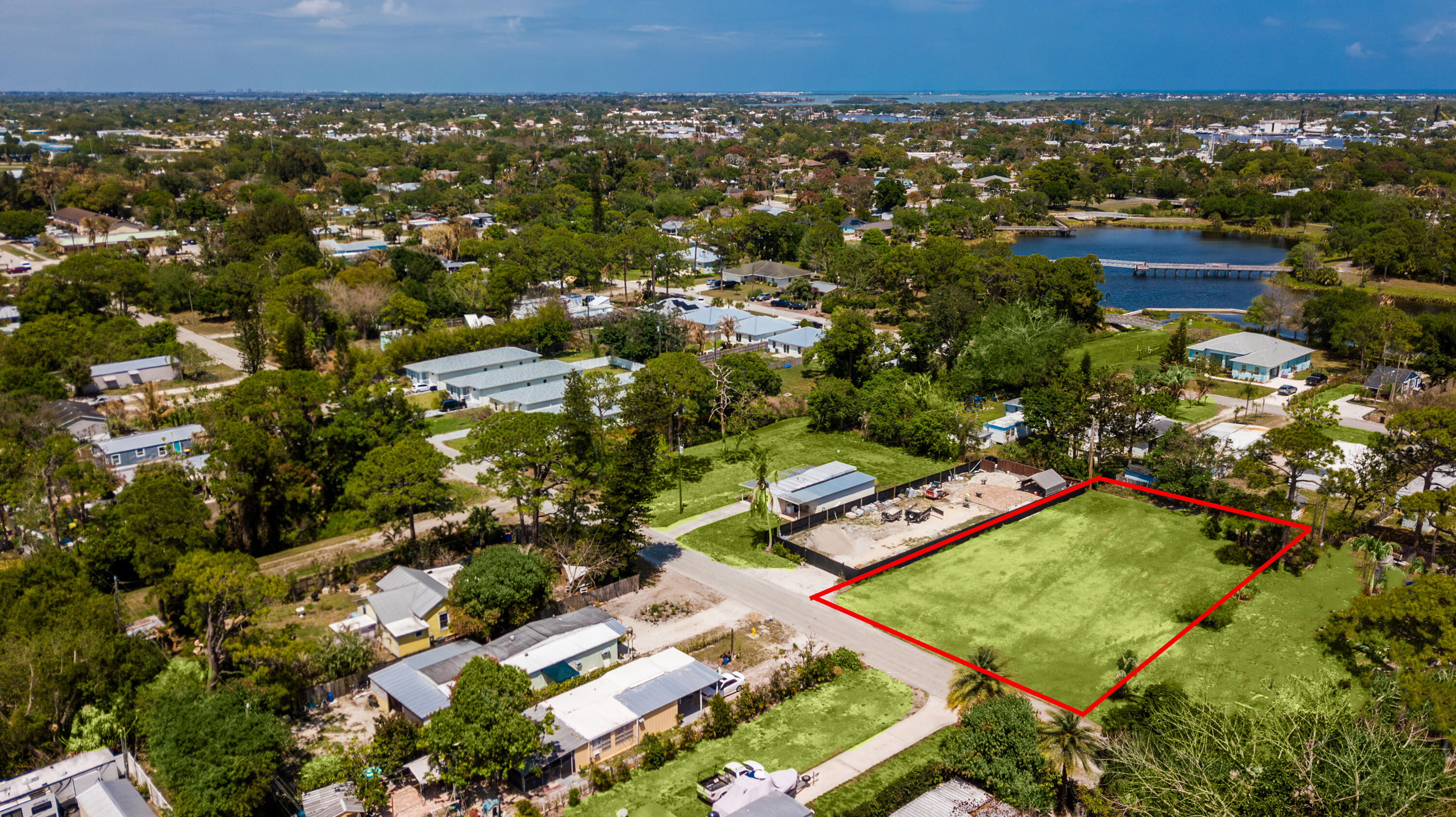 5279 Southeast Isabelita Avenue Stuart, FL 34997 - Photo 8 of 8 an aerial view of a house with a yard